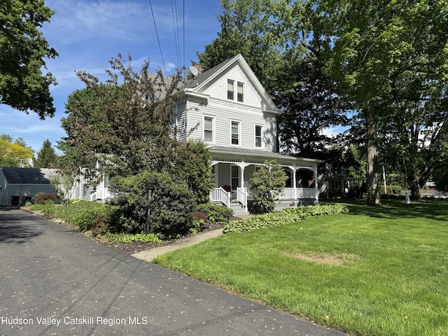 244 Jefferson Hts, Catskill, NY 12414 - victorian home with a porch and a front lawn