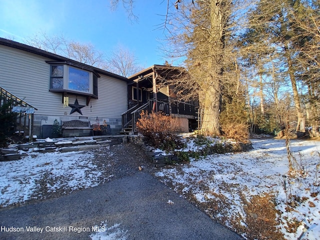 view of snow covered property