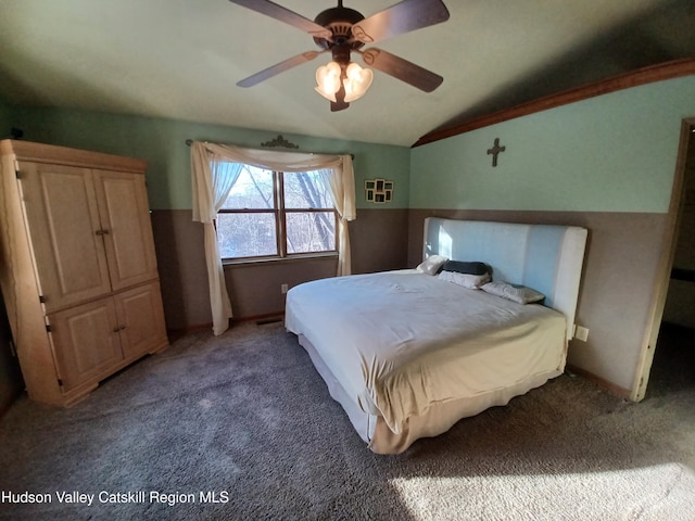 bedroom with carpet, ceiling fan, and lofted ceiling