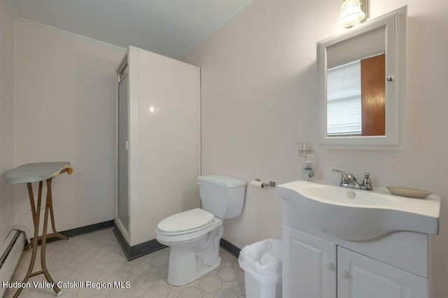 996 Dominican Ln, Saugerties, NY 12477 - bathroom featuring baseboard heating, vanity, and tile patterned floors