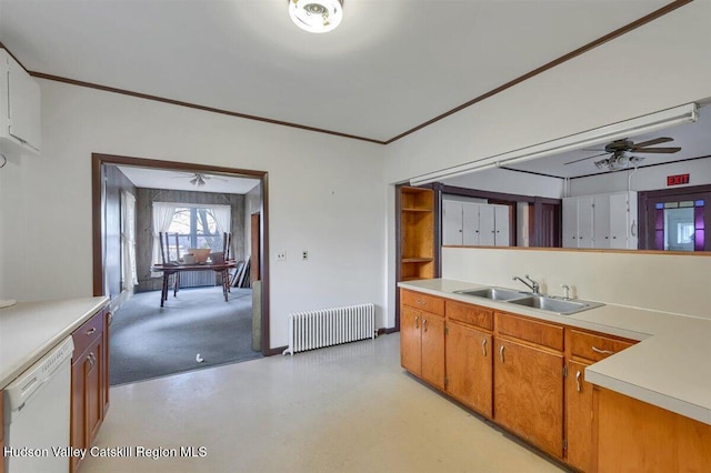996 Dominican Ln, Saugerties, NY 12477 - kitchen featuring radiator, ceiling fan, white dishwasher, light countertops, and brown cabinetry