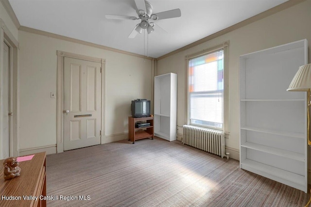 996 Dominican Ln, Saugerties, NY 12477 - unfurnished bedroom with radiator, ornamental molding, and ceiling fan