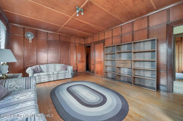 996 Dominican Ln, Saugerties, NY 12477 - living area with wood finished floors, wooden walls, and wooden ceiling
