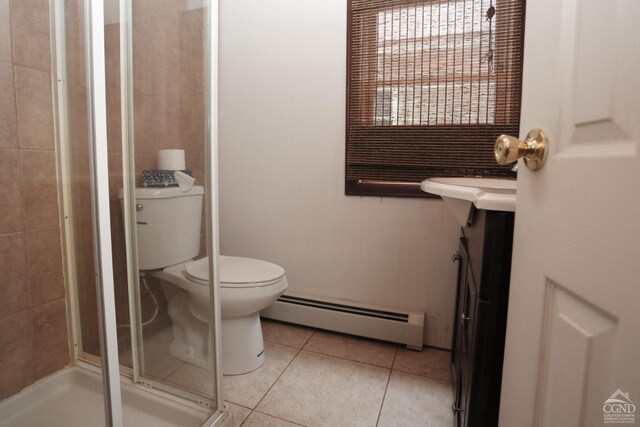 454 Niles Rd, Medusa, NY 12120 - full bathroom with baseboard heating, a shower stall, tile patterned flooring, toilet, and vanity