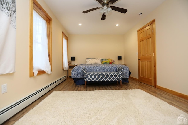 454 Niles Rd, Medusa, NY 12120 - bedroom with a baseboard heating unit, wood finished floors, recessed lighting, a ceiling fan, and baseboards