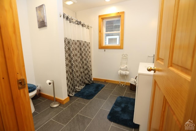 454 Niles Rd, Medusa, NY 12120 - full bath featuring baseboards, tile patterned floors, toilet, vanity, and a shower with curtain