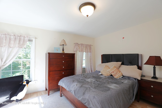 bedroom featuring light hardwood / wood-style flooring