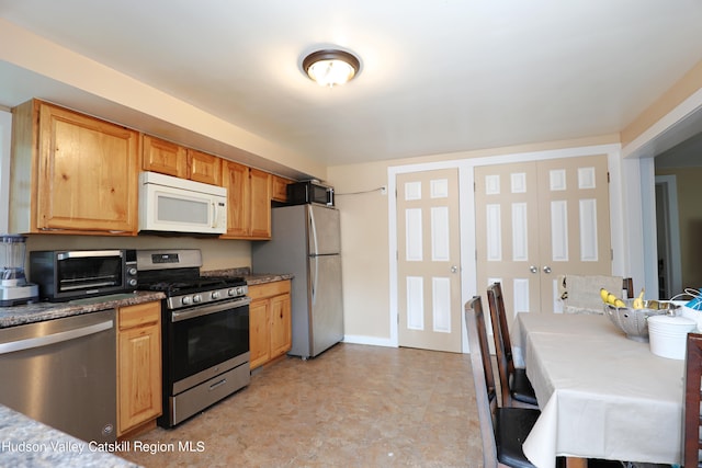 kitchen featuring appliances with stainless steel finishes