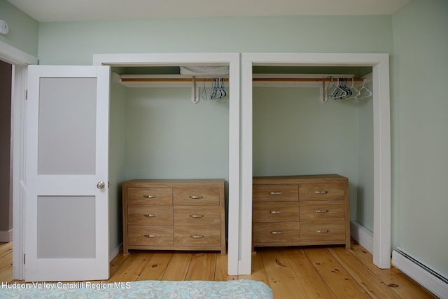 closet featuring a baseboard radiator