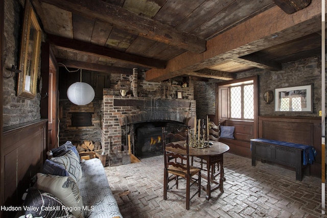 18 Striebel Rd, Woodstock, NY 12498 - living room featuring brick floor, a brick fireplace, wood ceiling, and beam ceiling