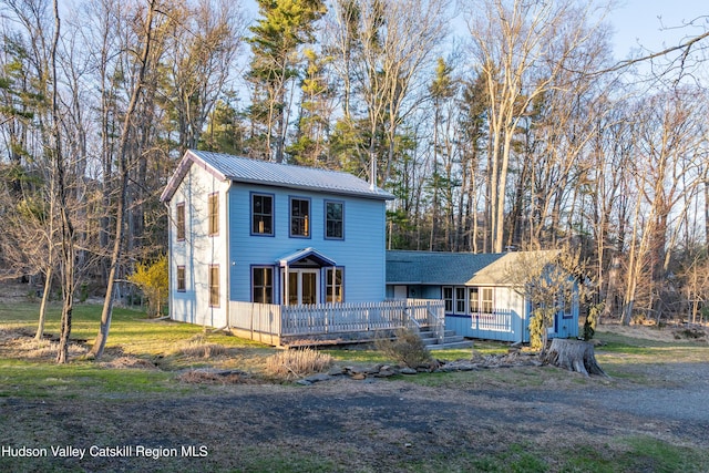 18 Striebel Rd, Woodstock, NY 12498 - view of front of house with metal roof and a wooden deck