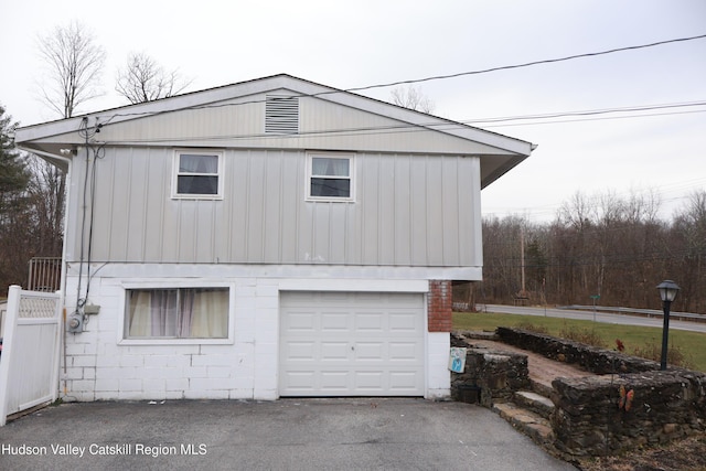 view of home's exterior with a garage