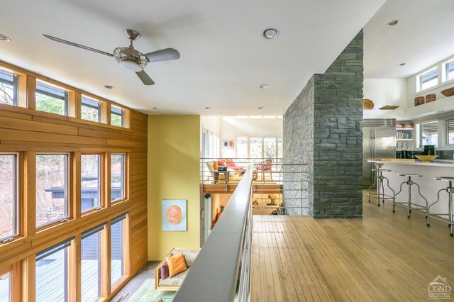 5015 Crow Hill Rd, Austerlitz, NY 12165 - game room featuring ceiling fan, hardwood / wood-style flooring, a high ceiling, wooden walls, and recessed lighting