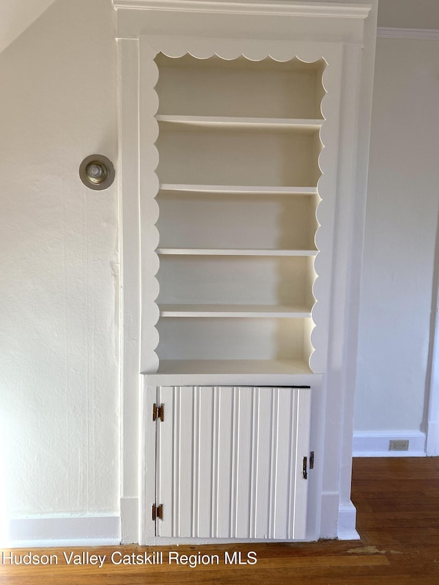 stairs with hardwood / wood-style flooring