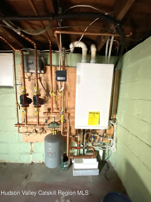 utility room with water heater