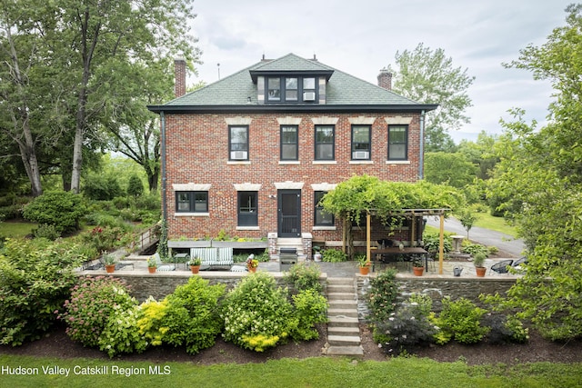 4170 Rte 9w, West Camp, NY 12477 - back of property featuring a chimney, stairs, brick siding, and a patio area