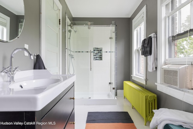 4170 Rte 9w, West Camp, NY 12477 - full bath featuring radiator heating unit, a stall shower, vanity, healthy amount of natural light, and ornamental molding