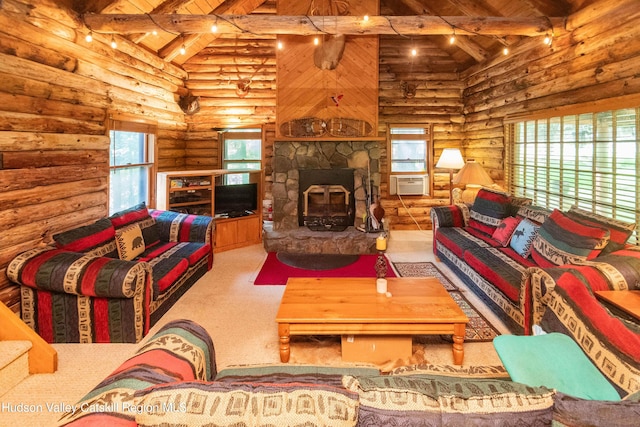 living room with beam ceiling, log walls, a healthy amount of sunlight, and wood ceiling