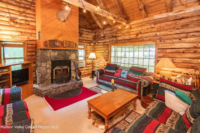 carpeted living room with plenty of natural light, beam ceiling, and rustic walls