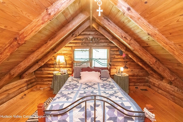 unfurnished bedroom with hardwood / wood-style floors, lofted ceiling with beams, wood ceiling, and rustic walls