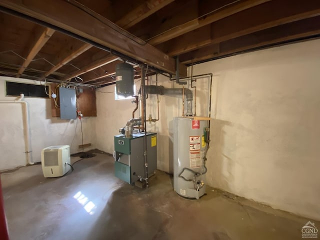 20 Joslen Pl, Hudson, NY 12534 - unfinished basement featuring water heater, electric panel, and a heating unit