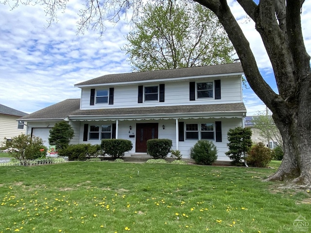 20 Joslen Pl, Hudson, NY 12534 - traditional-style home with a garage, a front yard, and covered porch