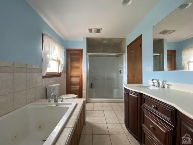 20 Joslen Pl, Hudson, NY 12534 - bathroom featuring tile patterned floors, a shower stall, vanity, a whirlpool tub, and tile walls