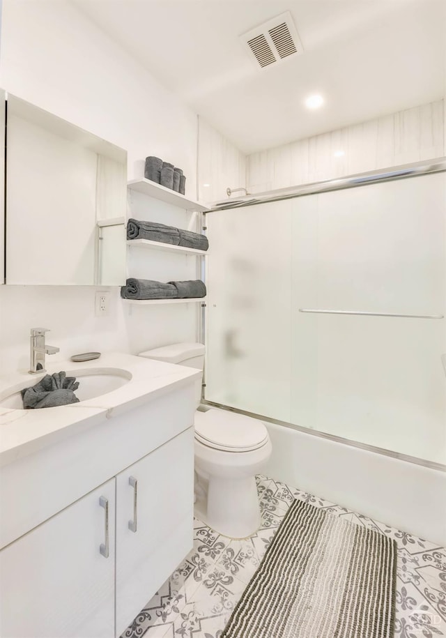 59 Scribner Hollow Rd # B-2, Hunter, NY 12442 - bathroom with vanity, toilet, shower / bath combination with glass door, and tile patterned floors