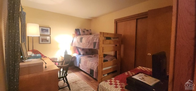 63 Windham Ridge Rd, Windham, NY 12496 - bedroom with wood finished floors, a desk, and a closet