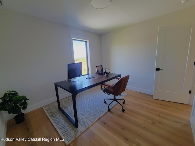 office area featuring light wood-type flooring