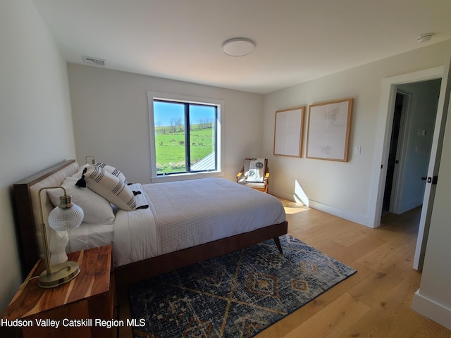 bedroom featuring light hardwood / wood-style flooring