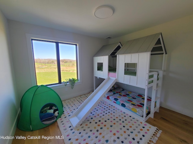 bedroom featuring hardwood / wood-style flooring