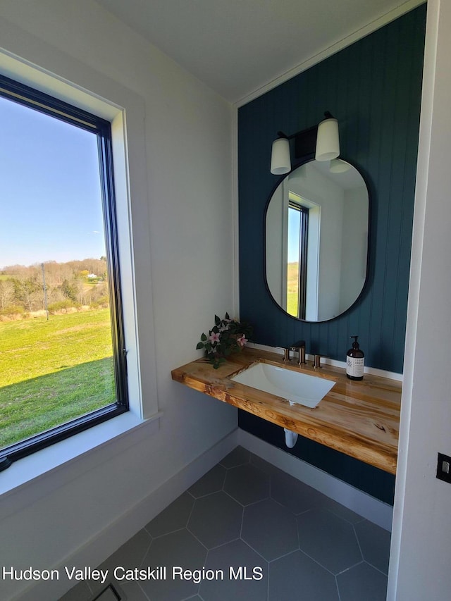 bathroom featuring tile patterned floors and sink