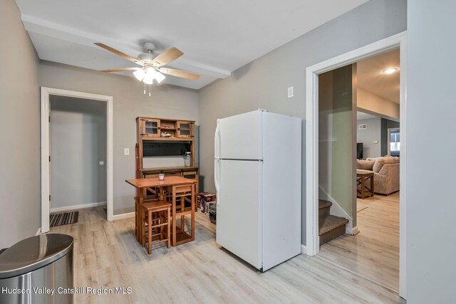 kitchen featuring white refrigerator, light hardwood / wood-style floors, and ceiling fan