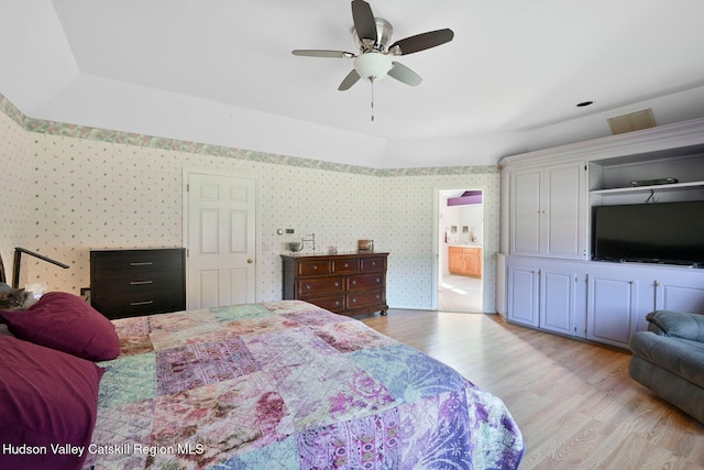 339-345 Jessup Rd, Florida, NY 10921 - bedroom featuring wood finished floors, wallpapered walls, ensuite bath, and ceiling fan