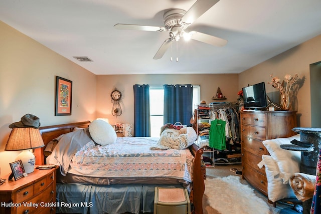 bedroom featuring ceiling fan