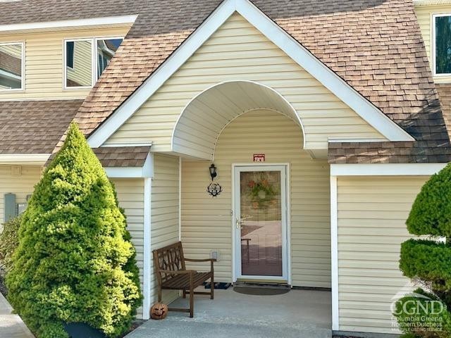 274 Brooksburgh Rd Unit 10, Windham, NY 12496 - entrance to property with roof with shingles and a patio area
