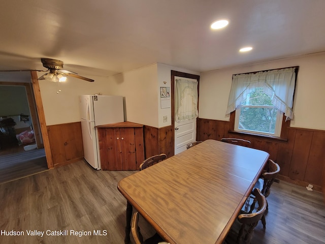 2457 State Route 82, Ancram, NY 12502 - dining area with a wainscoted wall, wood walls, wood finished floors, ceiling fan, and recessed lighting