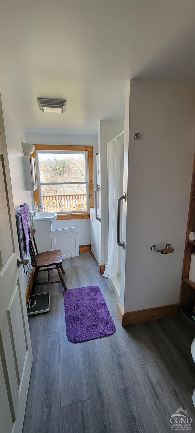 2457 State Route 82, Ancram, NY 12502 - full bath featuring a shower stall, wood finished floors, and baseboards
