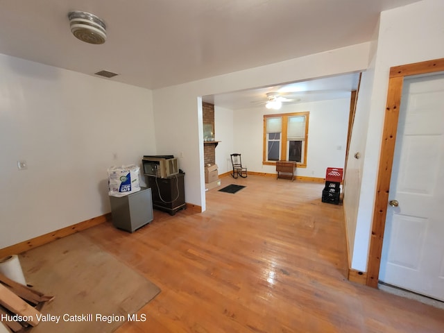 2457 State Route 82, Ancram, NY 12502 - unfurnished living room featuring light wood finished floors, a ceiling fan, and baseboards