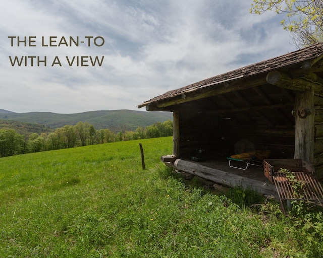 exterior space featuring a mountain view