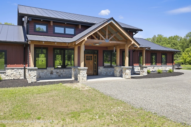 1248 Albany Post Rd, Gardiner, NY 12525 - view of front of house featuring a standing seam roof, covered porch, and metal roof