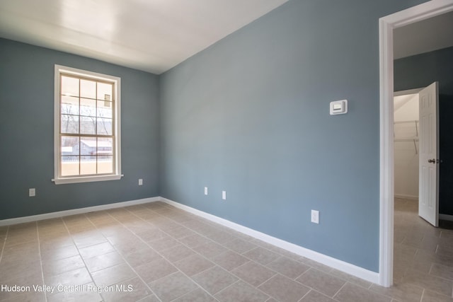 view of tiled spare room