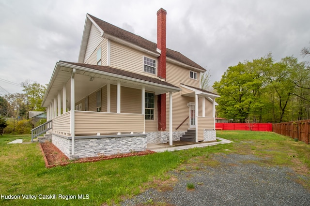 exterior space with a front lawn