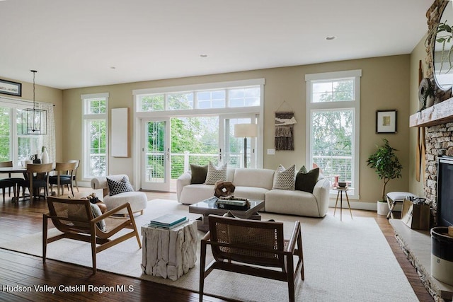 225 Lakeview Rd, Craryville, NY 12521 - living room featuring wood finished floors, a stone fireplace, and recessed lighting