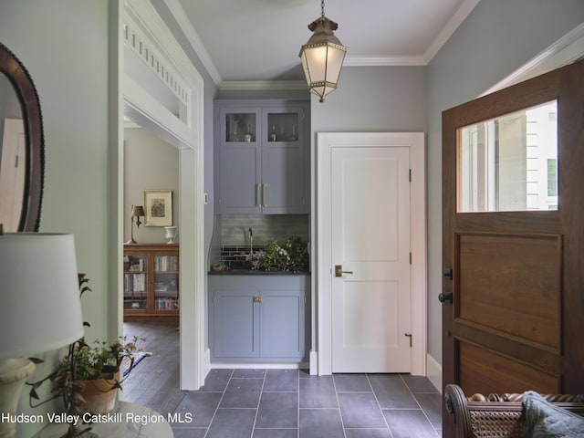 367 Cushetunk Dr, Cochecton Center, NY 12727 - entryway with crown molding and dark tile patterned flooring