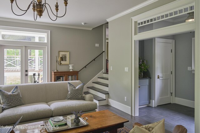 367 Cushetunk Dr, Cochecton Center, NY 12727 - living area featuring ornamental molding, baseboards, a chandelier, stairs, and dark wood-style flooring