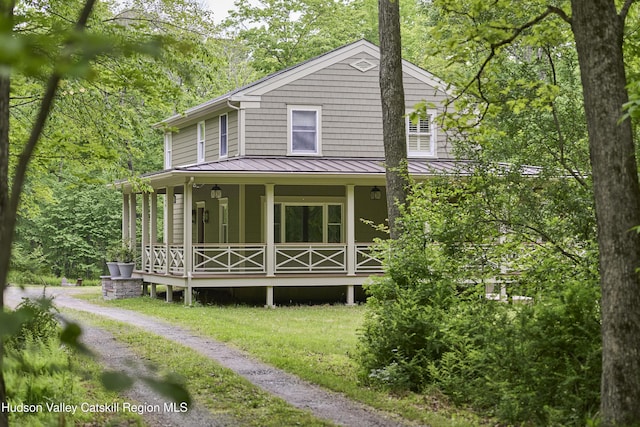 367 Cushetunk Dr, Cochecton Center, NY 12727 - view of front facade with a standing seam roof, covered porch, and metal roof