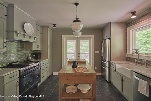 367 Cushetunk Dr, Cochecton Center, NY 12727 - kitchen featuring stainless steel appliances, dark tile patterned floors, and healthy amount of natural light