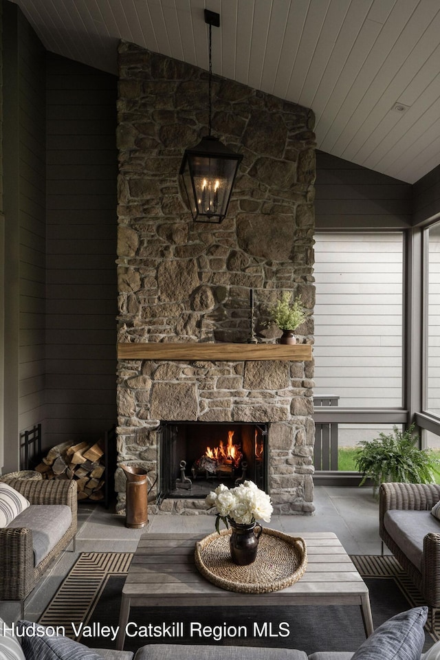 245 Brown Rd, Olivebridge, NY 12461 - living room with lofted ceiling, a stone fireplace, and wooden ceiling